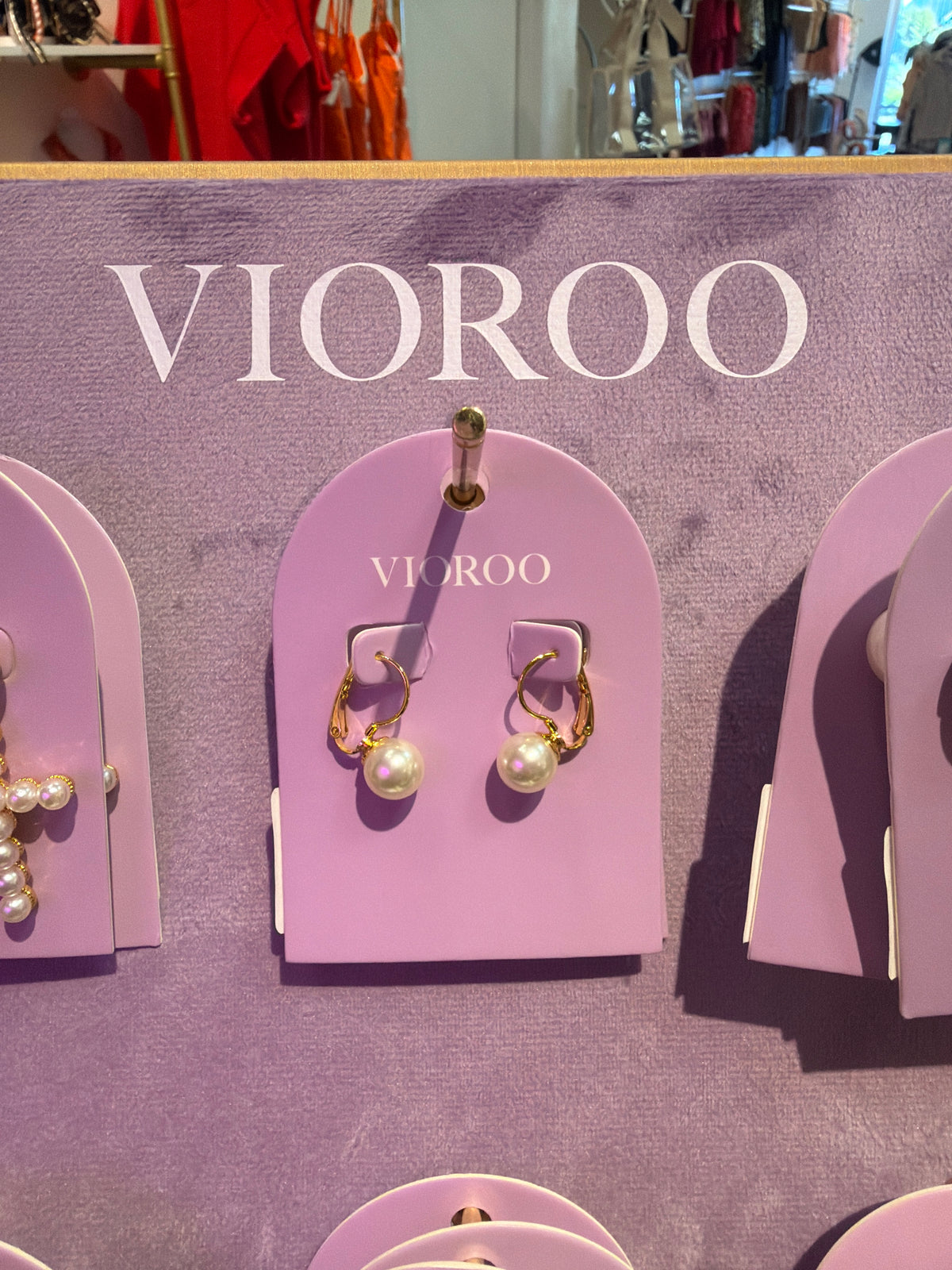 Single pearl drop earrings
